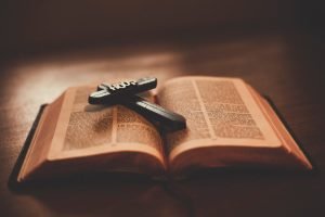 A Bible with Wooden Cross